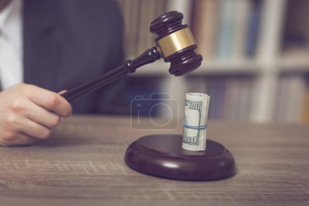 Photo for Detail of a corrupted judge saying a verdict on court. Selective focus - Royalty Free Image