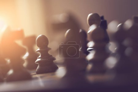 Photo for Close up of a wooden chess board and pieces. Selective focus - Royalty Free Image