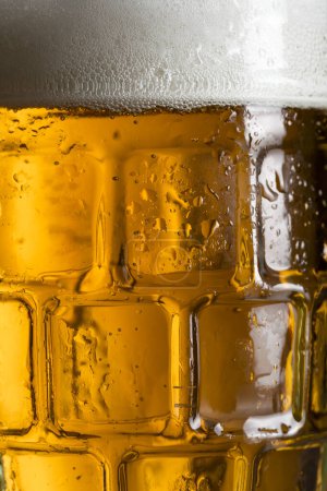 Photo for Close up of a cold light beer in a mug - Royalty Free Image