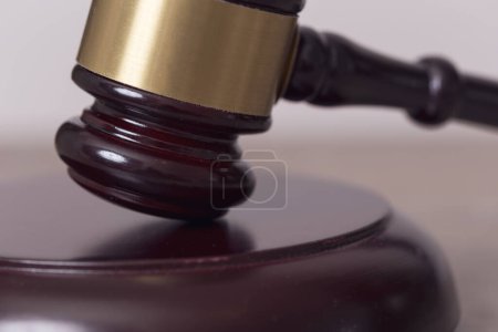 Photo for Close up of a judge gavel in a courtroom. Selective focus - Royalty Free Image