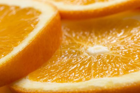 Photo for Close up of juicy orange fruit cross sections. Selective focus - Royalty Free Image