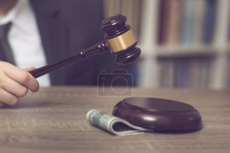 Photo for Detail of a corrupted judge saying a verdict on court. Selective focus - Royalty Free Image