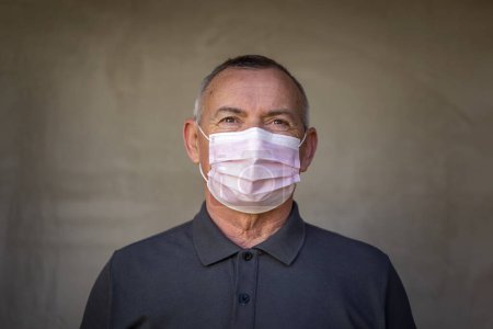 Photo for Portrait of man wearing medical face protection mask; air pollution or allergies protection, coronavirus, bacterial and viral respiratory infections prevention concept - Royalty Free Image