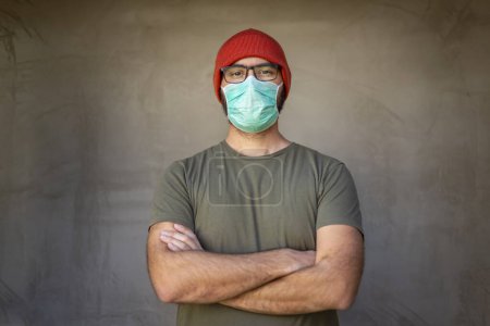 Photo for Portrait of man wearing medical face protection mask; air pollution or allergies protection, coronavirus, bacterial and viral respiratory infections prevention concept - Royalty Free Image