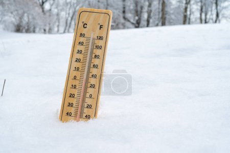 Photo for Thermometer in the snow. Winter, wave of frost, snowfall. - Royalty Free Image