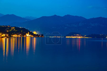 Photo for Lake Como, Tremezzina, Bellagio, the mountains above, at dusk. - Royalty Free Image
