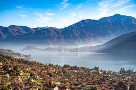Photo for The panorama of Lake Como photographed from Ossuccio, showing the Grigna, Bellagio, and the town of Ossuccio. - Royalty Free Image