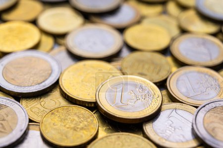 Photo for Euro coins close to each other, and 1 euro coin. - Royalty Free Image