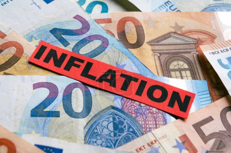 Photo for Euro banknotes background, with red ticket with text Inflation. - Royalty Free Image
