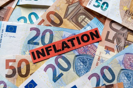 Photo for Euro banknotes background, with red ticket with text Inflation. - Royalty Free Image