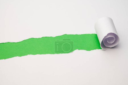 Photo for Colorful background, with torn and rolled white sheet - Royalty Free Image