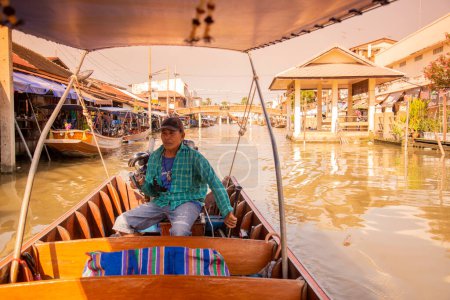 Photo for A Transport Tour Taxi Boat at the Klong Chula of the Mae Klong River in the Town of Amphawa in the Province of Samut Songkhram in Thailand,  Thailand, Amphawa, November, 2022 - Royalty Free Image