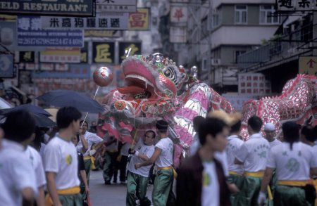 Photo for A Dragon Dance at the Chinese New Year in Yuen Long in the city of Hongkong in Hongkong.  China, Hongkong, January, 1997 - Royalty Free Image
