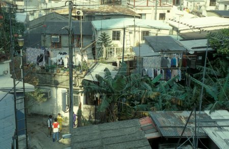 Téléchargez les photos : Le vieux village de Pok Fu Lam sur le Hongkong Isalnd à Hongkong. Chine, Hongkong, mai 1997 - en image libre de droit