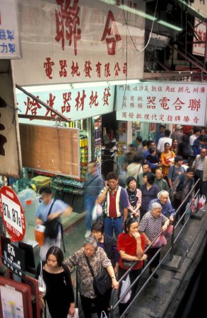 Photo for People in shopping street in the old town in Kowloon in the city of Hongkong in Hongkong.  China, Hongkong, December, 1997 - Royalty Free Image