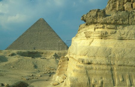 Photo for The pyramids of giza near the city of Cairo at the capital of Egypt in north africa.  Egypt, Cairo, March, 2000 - Royalty Free Image