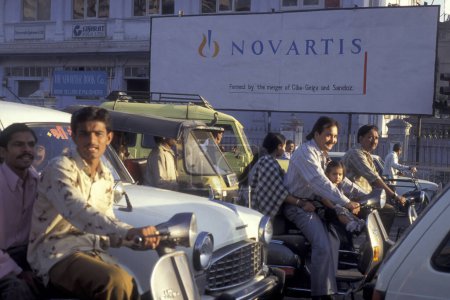 Photo for A advertising of the swiss pharma company Novartis in the city of Surat in the Province Gujarat in India.  India, Gujarat, April, 1998 - Royalty Free Image
