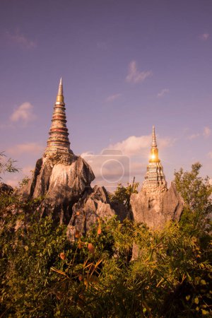 Photo for The Wat Phra Bat Phu Pha Daeng or Wat Chalermprakiet Prajomklao Rachanusorn Temple North of the City of Lampang in the Province of Lampang in North Thailand.  Thailand, Lampang, November, 2016 - Royalty Free Image