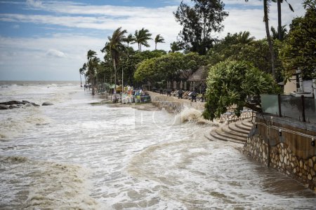 Photo for The Hua Hin Beach is floodet by storm, wind, and rain at the coast in the old town in the City of Hua Hin in the Province of Prachuap Khiri Khan in Thailand,  Thailand, Hua Hin, December, 2023 - Royalty Free Image
