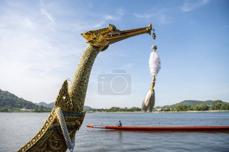 Photo for A front of a Dragonboat or Longboat on the Lake Khao Tao at the Longboat race of Hua Hin on the Lake Khao Tao reservoir south of City of Hua Hin.  Thailand, Hua Hin, December, 2023 - Royalty Free Image