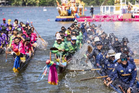 Photo for Dragonboat or Longboat teams at the opening ceremony on the Lake Khao Tao at the Longboat race of Hua Hin on the Lake Khao Tao reservoir south of City of Hua Hin.  Thailand, Hua Hin, December, 2023 - Royalty Free Image