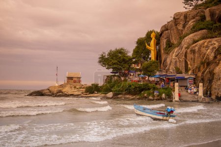 Photo for The Beach with the standing Buddha at Wat Khao Takiab near the City of Hua Hin in the Province of Prachuap Khiri Khan in Thailand,  Thailand, Hua Hin, December, 2022 - Royalty Free Image