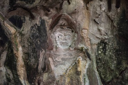 Photo for A stone carving Buddha figure Tham Ruesi Khao Ngu a the Tham Khao Ngu Cave in the Province of Ratchaburi in Thailand,  Thailand, Ratchaburi, November, 15, 2023 - Royalty Free Image