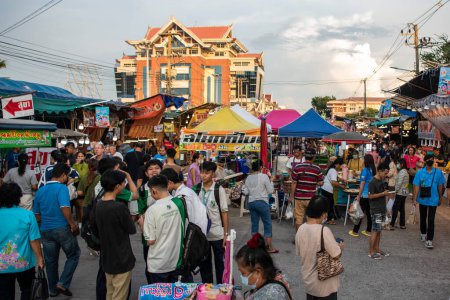 Photo for People enjoy the large Fair with Food stalls and large Market at Buffalo Race Festival or Wing Khwai in Mueang Chonburi City and Province in Thailand.  Thailand, Chonburi, October, 27, 2023 - Royalty Free Image