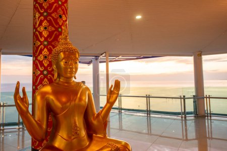 Photo for A Buddha at Viewpoint Tower of Wat Hong Thong on Coast in Bang Pakong in Province of Chachoengsao in Thailand.  Thailand, Chachoengsao, November, 2, 2024 - Royalty Free Image