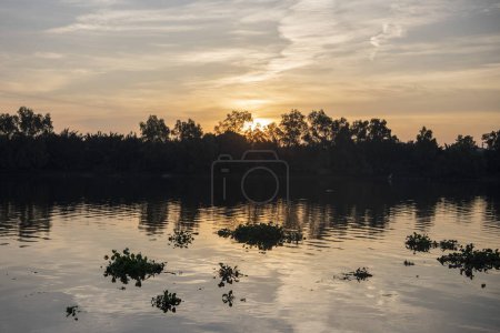 sunrise on Mae Nam Bang Pakong River in city Mueang Chachoengsao City in Province of Chachoengsao in Thailand.  Thailand,
