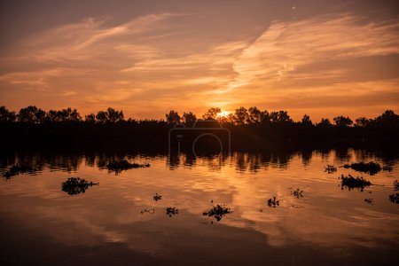 sunrise on Mae Nam Bang Pakong River in city Mueang Chachoengsao City in Province of Chachoengsao in Thailand.  Thailand,