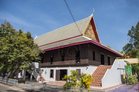 Photo for Old Wood House at Wat Mani Wanaram in the city centre of Udon Ratchathani and Province Ubon Ratchathani in Thailand.  Thailand, Ubon Ratchathani, November 23, 2023 - Royalty Free Image