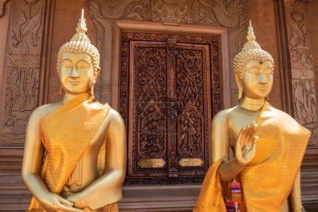 Photo for Buddhas at Wat Maha Wanaram in the city Udon Ratchathani and Province Ubon Ratchathani in Thailand.  Thailand, Ubon Ratchathani, November, 23, 2023 - Royalty Free Image