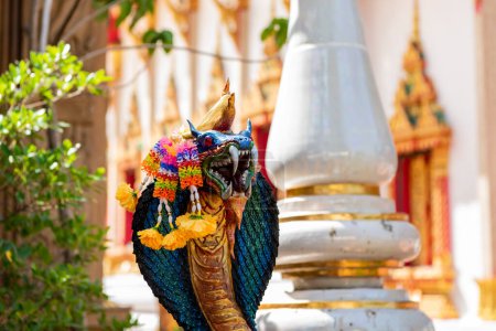 Cobra figure at Wat Maha Wanaram in the city Udon Ratchathani and Province Ubon Ratchathani in Thailand. Thailand, Ubon Ratchathani, November 23, 2023