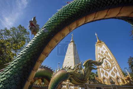Thailand, Ubon Ratchathani -  November 24, 2023: Rainbow carve serpent surrounding Sri Maha Pho Chedi of Wat Phra That Nong Bua Temple in the city centre of Ubon Ratchathani and Province Ubon Ratchathani in Thailand.