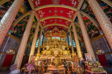 Photo for Thailand, Ubon Ratchathani - November, 24 2023: Atmosphere inside an important religious site with sculptures and statues at Wat Phra That Nong Bua Temple in city centre and Province Ubon Ratchathani in Thailand. - Royalty Free Image