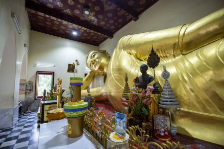 Photo for Thailand, Nakhon Pathom, November, 9, 2023: Reclining Buddha inside of the Phra Pathom Chedi in the city center of Nakhon Pathom and Province Nakhon Pathom in Thailand. - Royalty Free Image