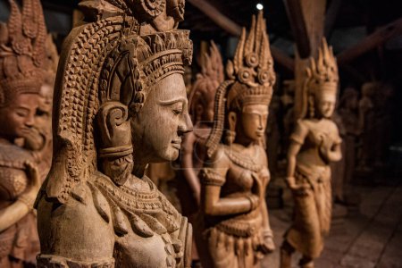 Photo for Thailand, Nakhon Pathom, November, 11, 2023: Wood Carving Figures at the Wood Land Museum near city and Province Nakhon Pathom in Thailand. - Royalty Free Image