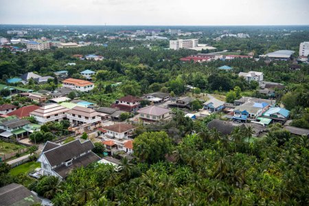 Town view from the Tower of Wat Sam Phram or Dragon Temple near city and Province Nakhon Pathom in Thailand.  Thailand, Nakhon Pathom, November 12, 2023