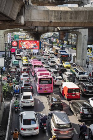 Photo for Traffic with cars on the road at the Siam Square in the city of Bangkok in Thailand.  Thailand, Bangkok, December, 8, 2023 - Royalty Free Image