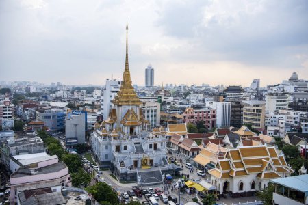 Photo for A view of Wat Traimit Withayaram Worawihan in China Town in the city of Bangkok in Thailand.  Thailand, Bangkok, November, 6, 2023 - Royalty Free Image