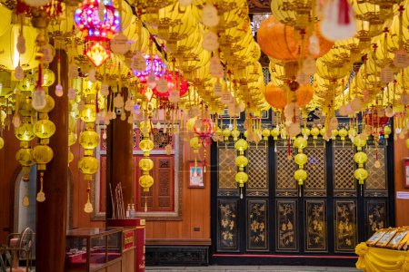 Photo for Chinese Lanterns at Wat Mangkon Kamalawat or Wat Leng Noei Yi in China Town in the city of Bangkok in Thailand.  Thailand, Bangkok, November, 8, 2023 - Royalty Free Image