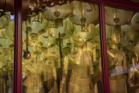 Photo for Buddha figures at Wat Mangkon Kamalawat or Wat Leng Noei Yi in China Town in the city of Bangkok in Thailand.  Thailand, Bangkok, November, 8, 2023 - Royalty Free Image