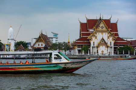 Photo for The Wat Rakhang on Chao Phraya River in city of Bangkok in Thailand.  Thailand, Bangkok, December, 5, 2023 - Royalty Free Image