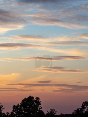 Photo for Sunset with beautiful cloudscape and landscape silhouette - Royalty Free Image