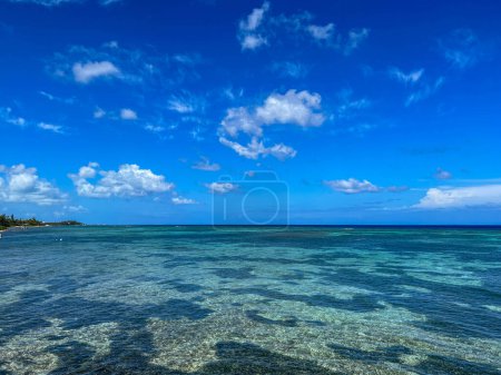 The reef off of the north side of Cayman Islands on a beautiful sunny day.