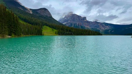 The beautiful Emerald Lake in Yoho National Park in Canada on a cloudy spring day.