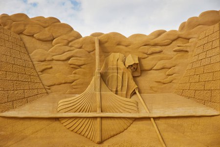 Photo for Sondervig, Denmark, May 21, 2023: International Sand Sculpture Festival. Charon is the carrier of the souls of the dead - Royalty Free Image