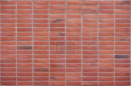 Photo for Memorial. Brick wall with the names of ancient ships in Denmark. - Royalty Free Image