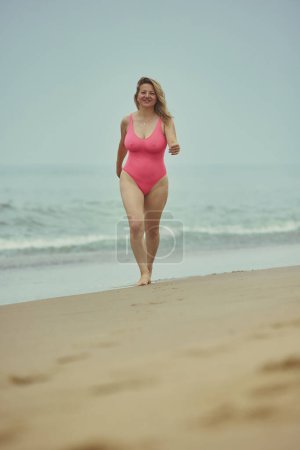 Attractive woman on the beach in Denmark.
